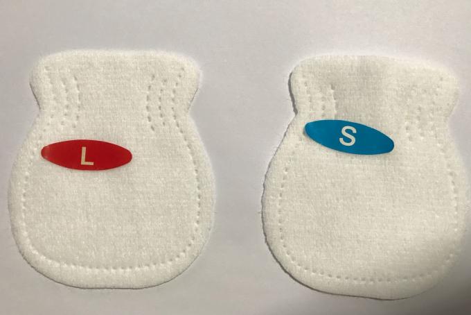新生の生地のゴムの手袋のためのS Lサイズ独特な様式の赤ん坊の心配プロダクト