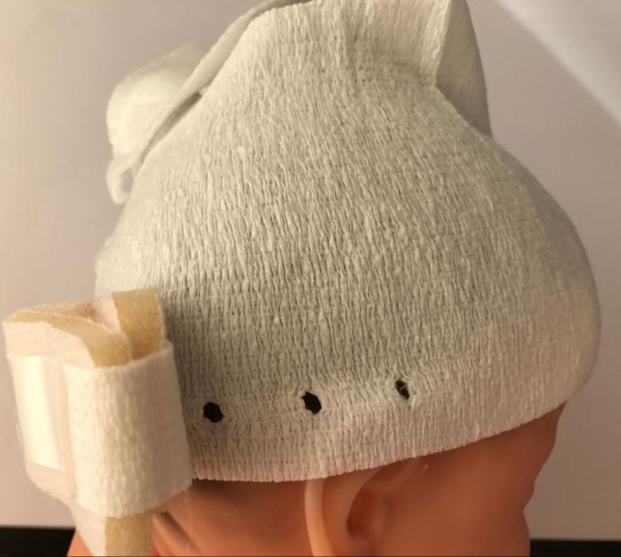 不織布の生地の幼児赤ん坊の帽子はヘッド保護のための汗を吸収します