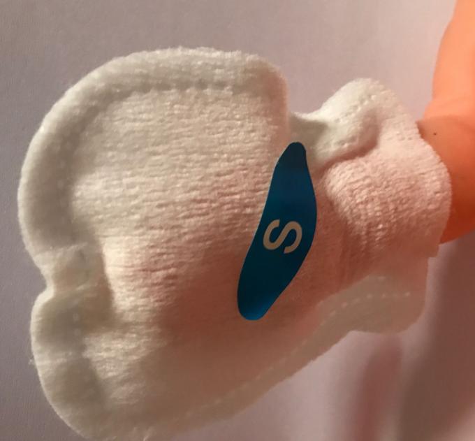 新生の生地のゴムの手袋のためのS Lサイズ独特な様式の赤ん坊の心配プロダクト